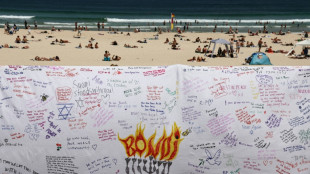Australian lifeguards fall silent for Bondi Beach victims
