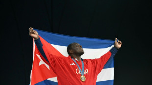 Wrestling legend Lopez calls for Cuban sport to 'open up' to the world