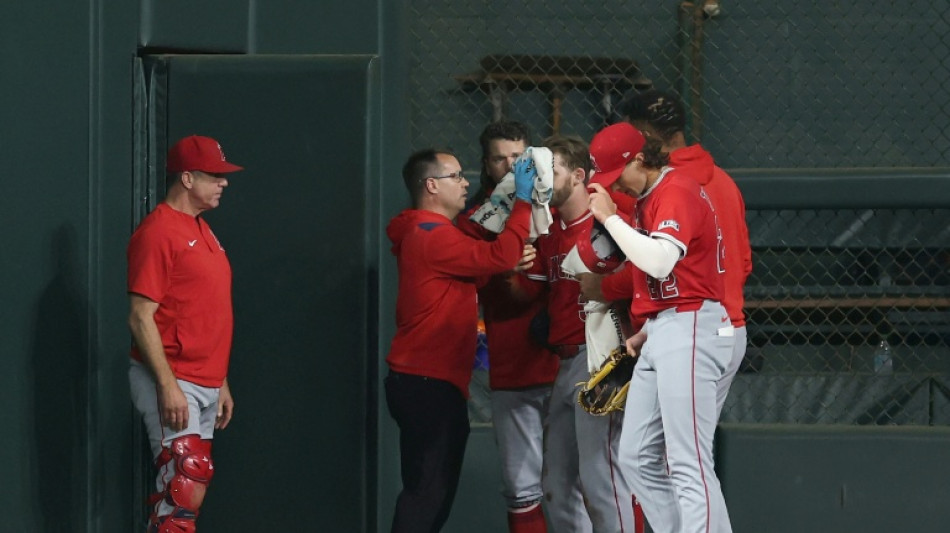Angels Ward carted off after colliding with scoreboard