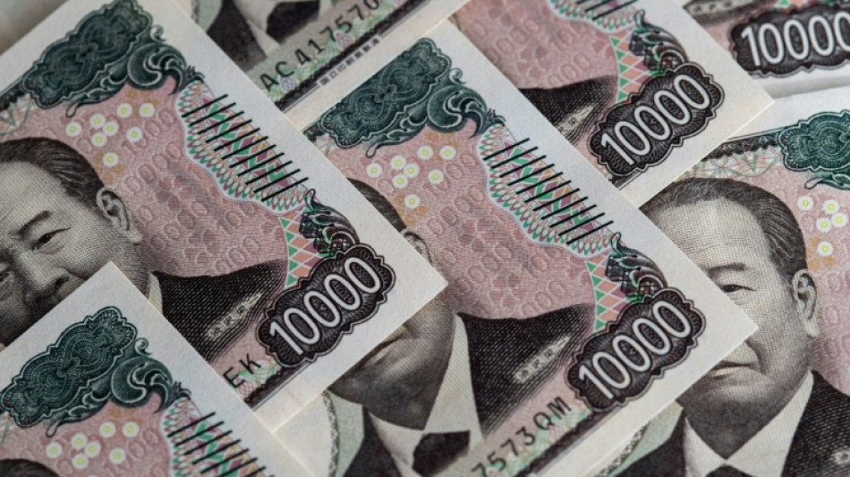 Stocks fluctuate as traders await next moves in Trump trade war