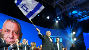 In tight Israel vote, both camps hold out cautious hope