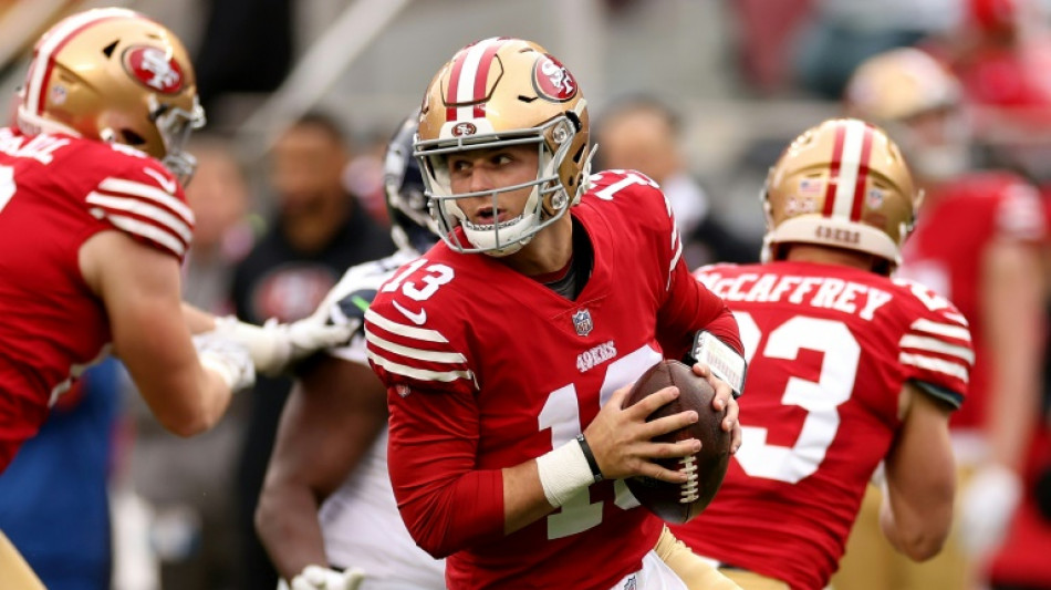 Rookie Purdy leads 49ers past Seattle in playoff opener