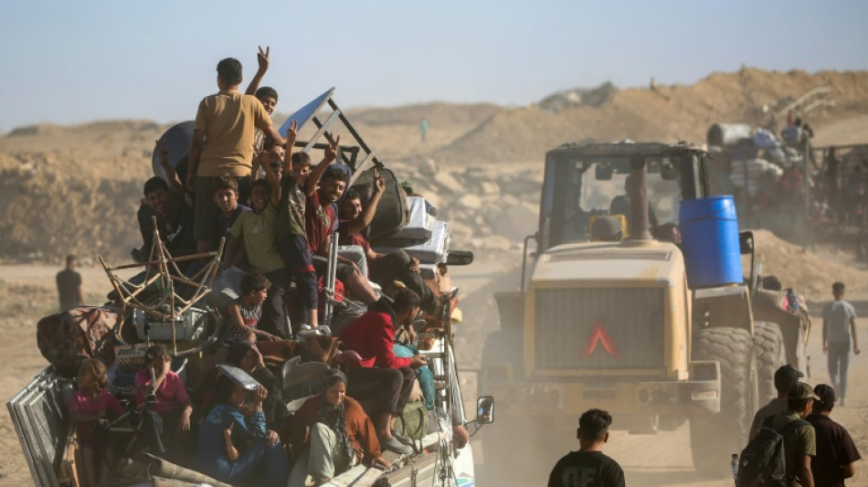 Los palestinos vuelven a una Ciudad de Gaza devastada