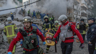 Russia pummels Kyiv, killing at least 10 and denting peace hopes