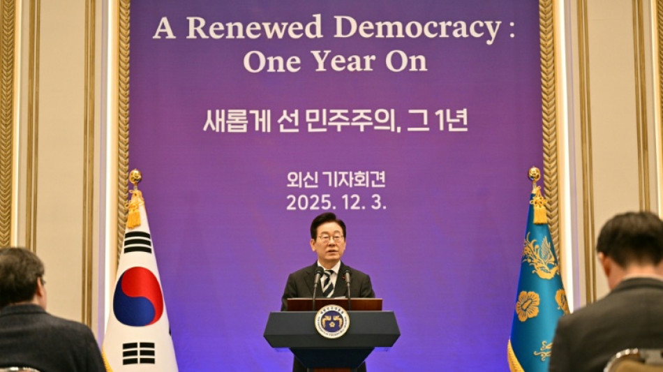 South Korea overcame 'crisis', leader says year after martial law