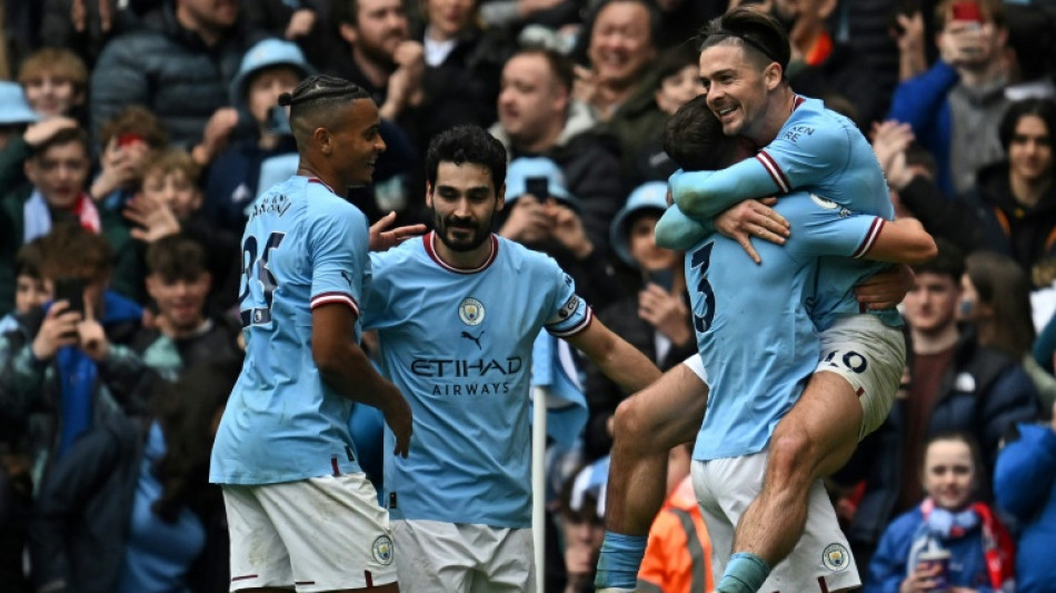 Man City thrash Liverpool but Jesus keeps Arsenal eight points clear