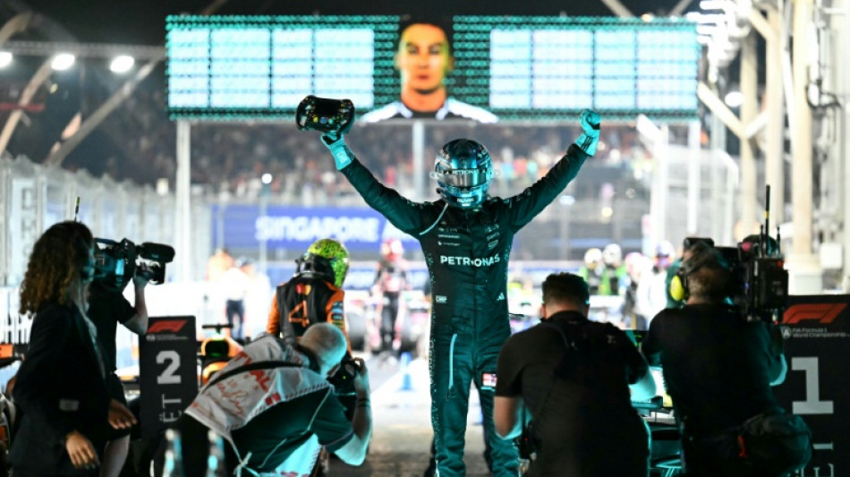 Russell wins Singapore GP, McLaren seal constructors' title