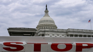 Asian stocks mixed, Wall St futures drop as US heads for shutdown